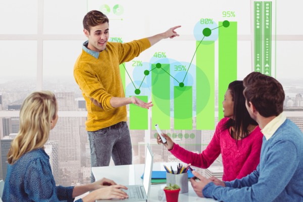 Unmatched Business Insights with Gas Deck Team in a Meeting Reviewing Performance Charts and Data Visualization