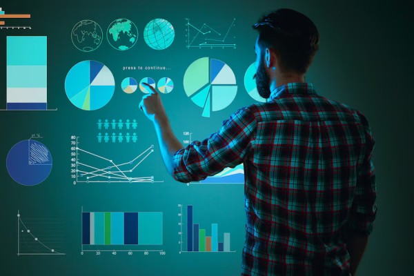 Enhance Customer Experience with Data-Driven Strategies A Customer Making a Contactless Card Payment at a Gas Station While Sitting in a Car