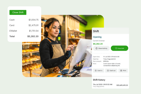 Business Professional Reviewing Real-Time Analytics Dashboard on Multiple Screens
